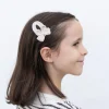 Clip lazo crochet beige