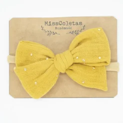 Diadema bebé lazo amarillo ocre topos oro