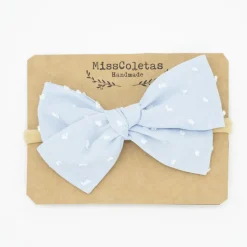 Diadema bebé lazo azul celeste plumeti