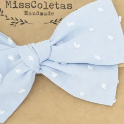 Diadema bebé lazo azul celeste plumeti