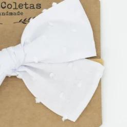 Diadema bebé lazo blanca plumeti