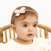 Diadema bebé lazo crochet beige