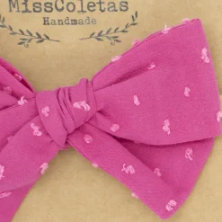 Diadema bebé lazo fucsia plumeti