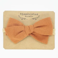 Diadema bebé lazo naranja rústico