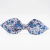 Diadema lazo flores azul marino hecha a mano