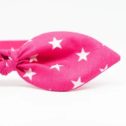 Diadema lazo fucsia estrellas hecho a mano