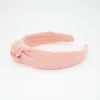 Diadema nudo coral plumeti hecha a mano
