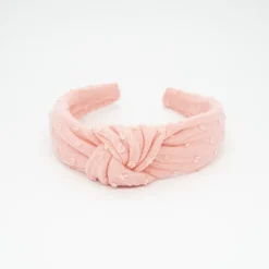 Diadema nudo coral plumeti hecha a mano