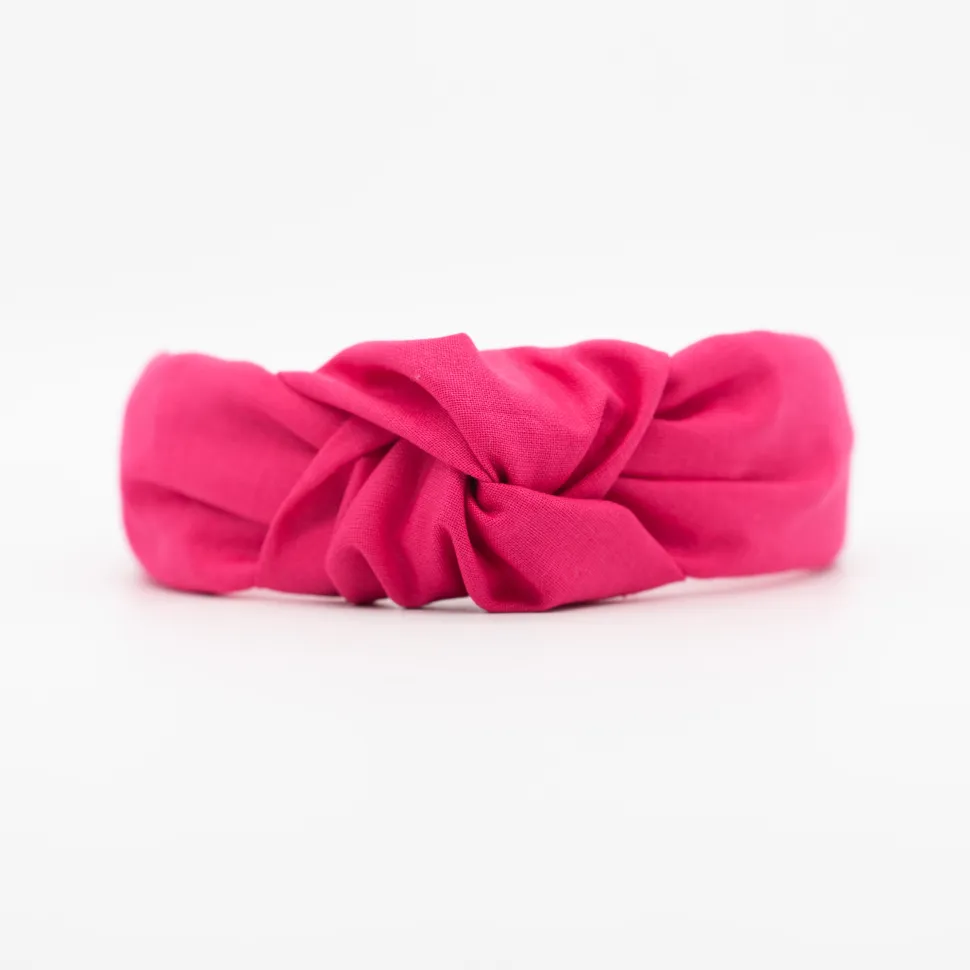Diadema nudo fucsia hecha a mano