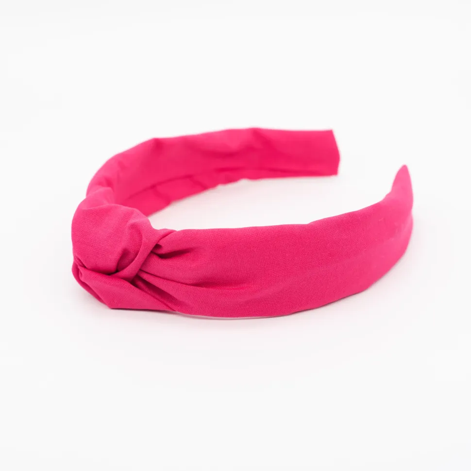 Diadema nudo fucsia hecha a mano
