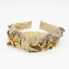 Diadema nudo sinamay dorado flores