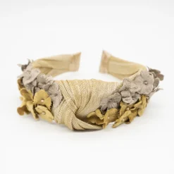 Diadema nudo sinamay dorado flores