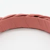 Diadema trenzada rosa