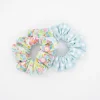 Pack coleteros scrunchies baño flores tropical