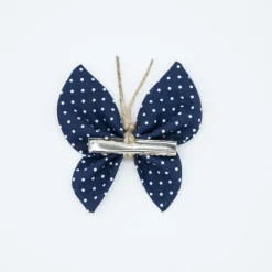 Pinza mariposa azul marino topos