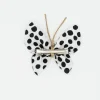 Pinza mariposa blanca topos negros