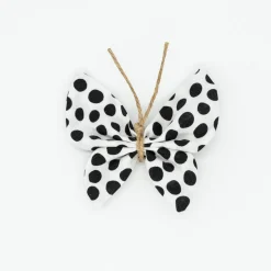 Pinza mariposa blanca topos negros