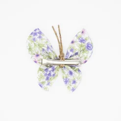 Pinza mariposa flores malva