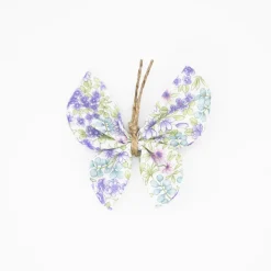 Pinza mariposa flores malva