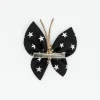 Pinza mariposa negra estrellas