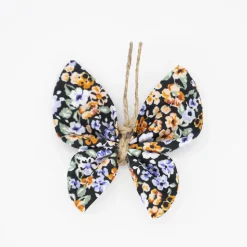 Pinza mariposa negra flores multicolor