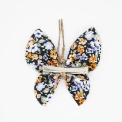 Pinza mariposa negra flores multicolor