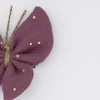 Pinza mariposa purpura topos oro