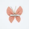 Pinza mariposa rosa topos