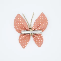 Pinza mariposa rosa topos